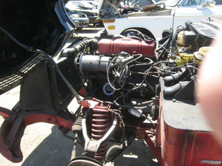 Illustration for article titled Junkyard Jackpot: BMW 2002, Corolla GT-S, Triumph Spitfire